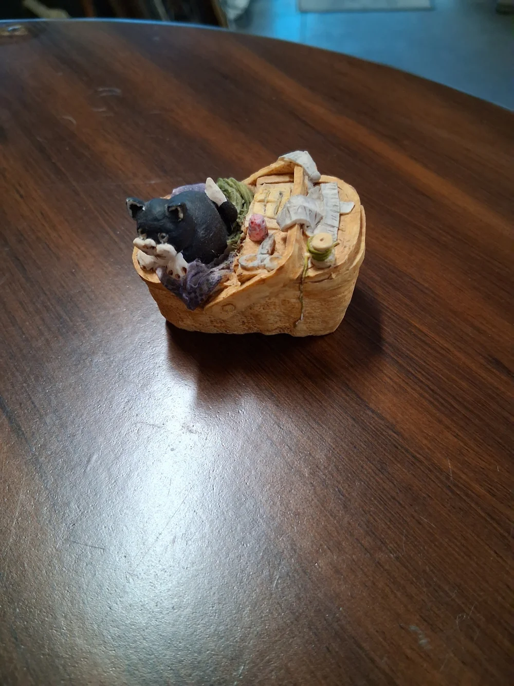 Used Black Cat Figurine in Wicker Basket Decorative Ornament.